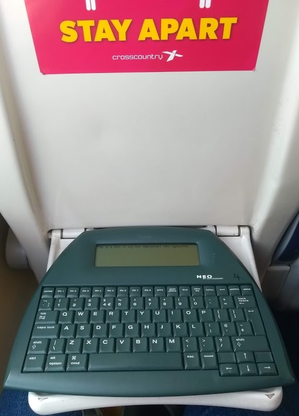 The AlphaSmart Neo fits perfectly on CrossCountry trains' pull-down tables.